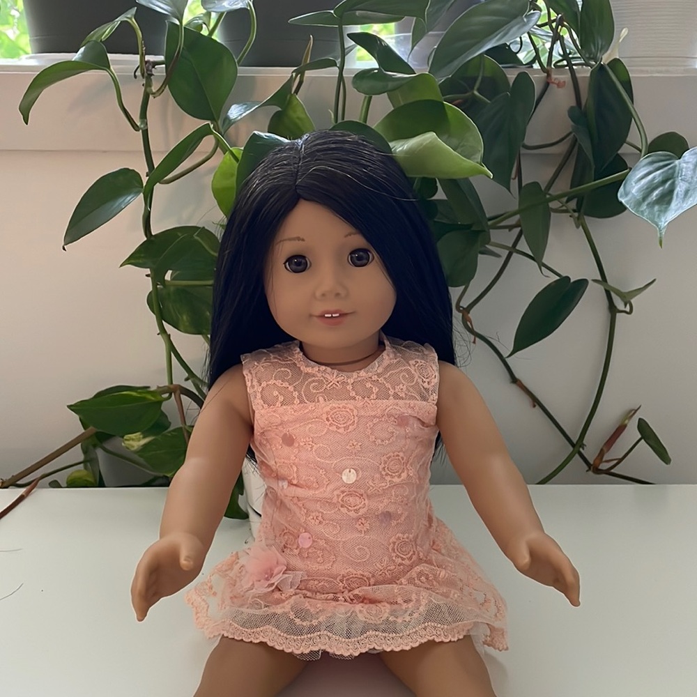 American Girl Doll, peach dress
pink underwear and light punk sandals
